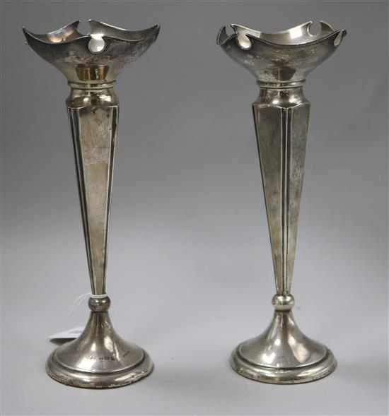 A matched pair of early 20th century silver spill vases, 24cm.